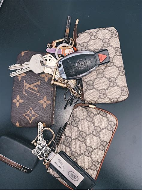 louis vuitton lock and key fake|Louis Vuitton keychain wallet.